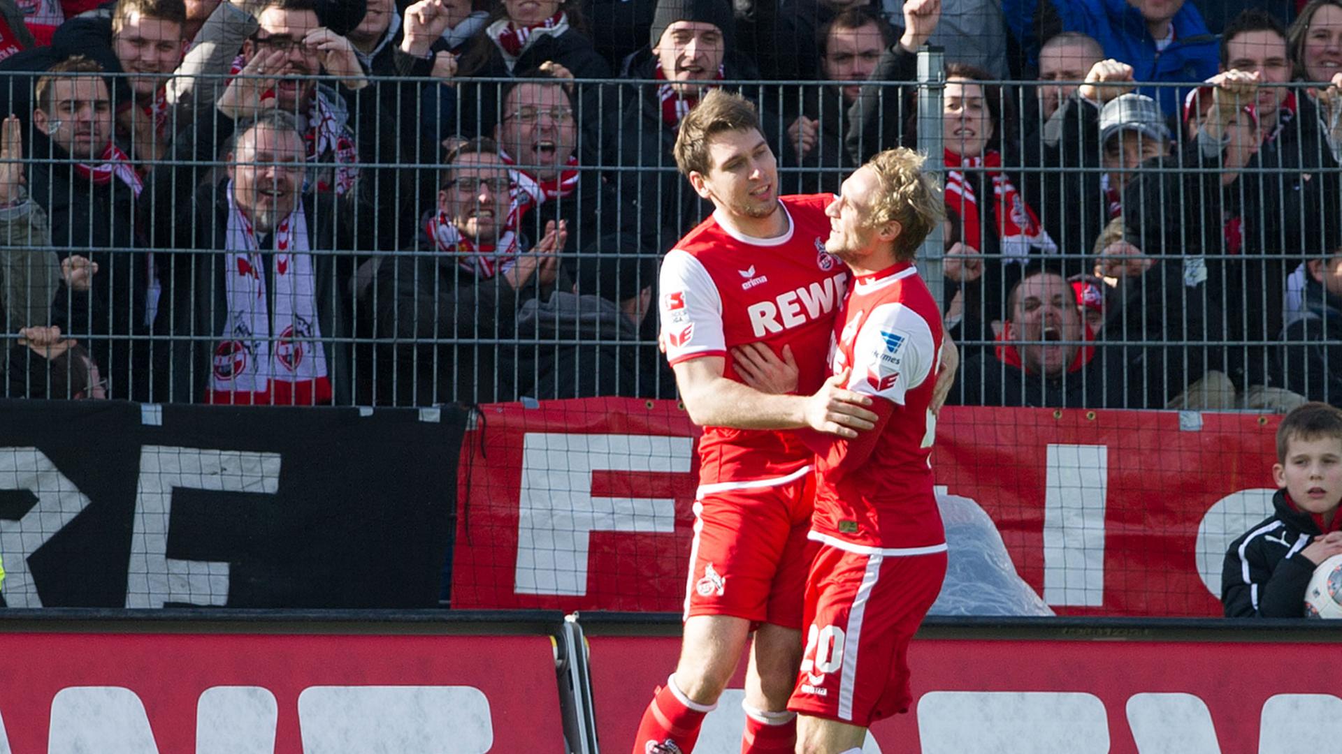 Fußball 2. Bundesliga 21. Spieltag: SV Sandhausen 1916 - 1. FC Köln am 16.02.2014 in Sandhausen (Baden-Württemberg) im Hardtwaldstadion. Die Kölner Patrick Helmes (l) und Marcel Risse jubeln über das Tor zum 0:1. Fußball 2. Bundesliga 21. Spieltag: SV Sandhausen 1916 - 1. FC Köln am 16.02.2014 in Sandhausen (Baden-Württemberg) im Hardtwaldstadion. Die Kölner Patrick Helmes (l) und Marcel Risse jubeln über das Tor zum 0:1.