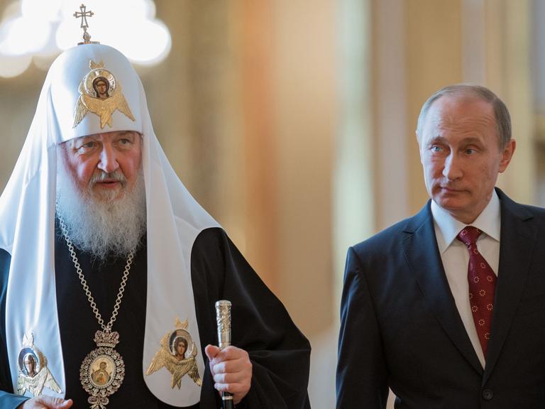 Der russische Präsident Wladimir Putin und der Patriarch der russisch-orthodoxen Kirche Kirill im Juli 2013 in Moskau.
