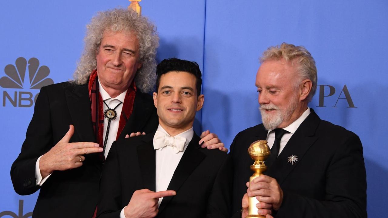 Golden Globe-Gewinner Rami Malek ("Bohemian Rhapsody") mit Queen-Schlagzeuger Roger Taylor (r) und Queen-Gitarrist Brian May (l) Golden Globe-Gewinner Rami Malek ("Bohemian Rhapsody") mit Queen-Schlagzeuger Roger Taylor (r) und Queen-Gitarrist Brian May (l)