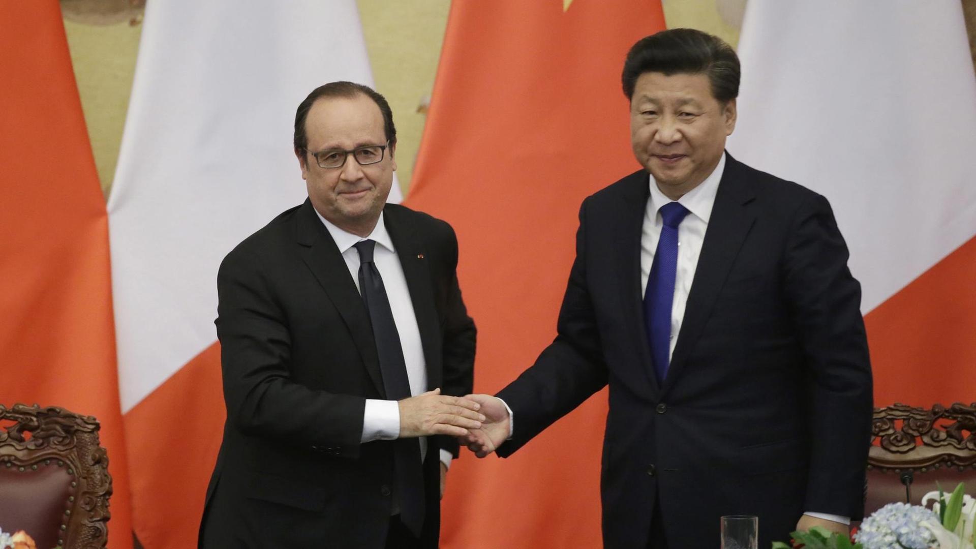 Frankreichs Präsident Hollande und der chinesische Präsident Xi Frankreichs Präsident Hollande und der chinesische Präsident Xi