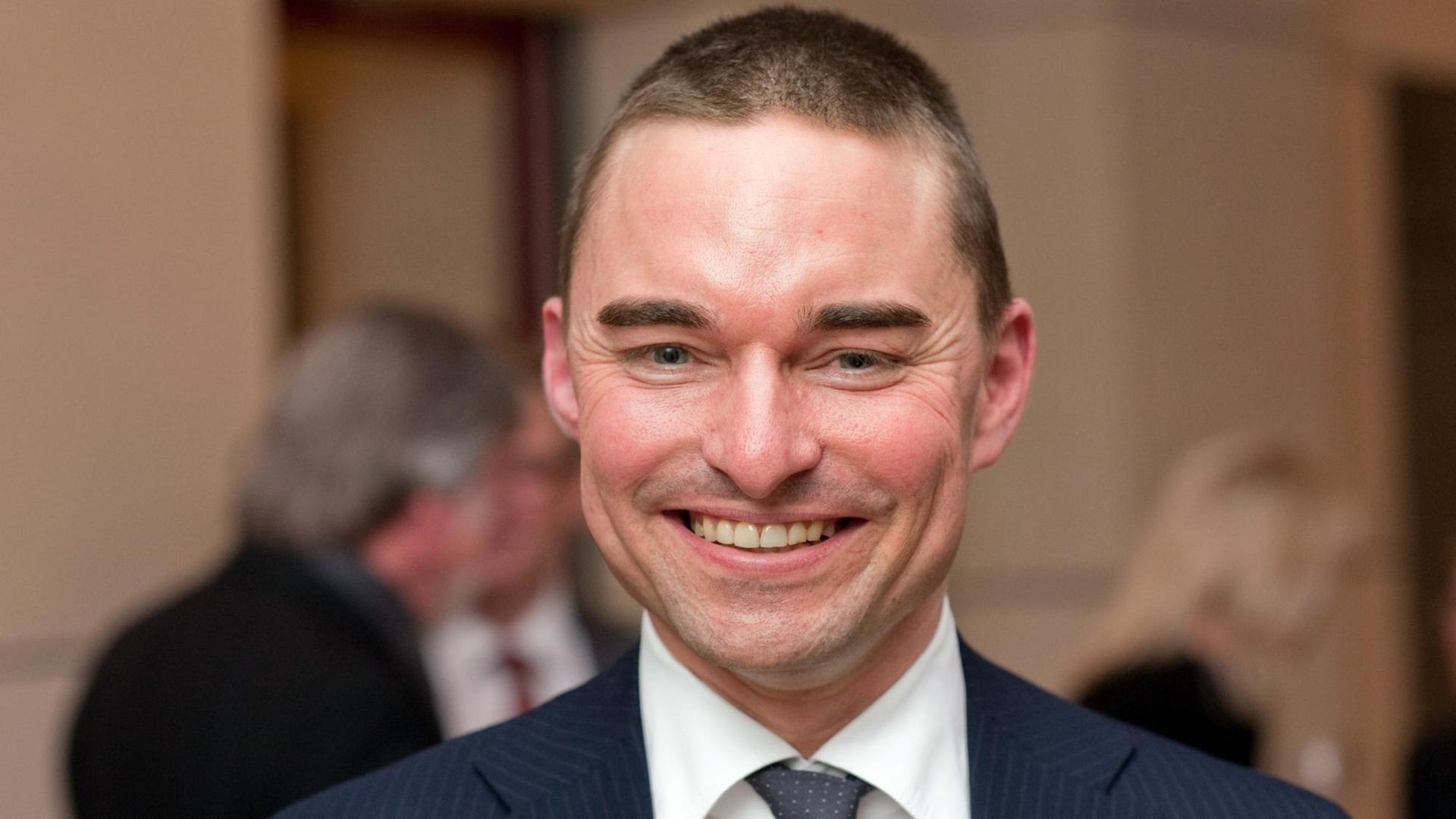 Der Unternehmer Lars Windhorst lächelt während einer Veranstaltung im Reichstag. Der Unternehmer Lars Windhorst lächelt während einer Veranstaltung im Reichstag.
