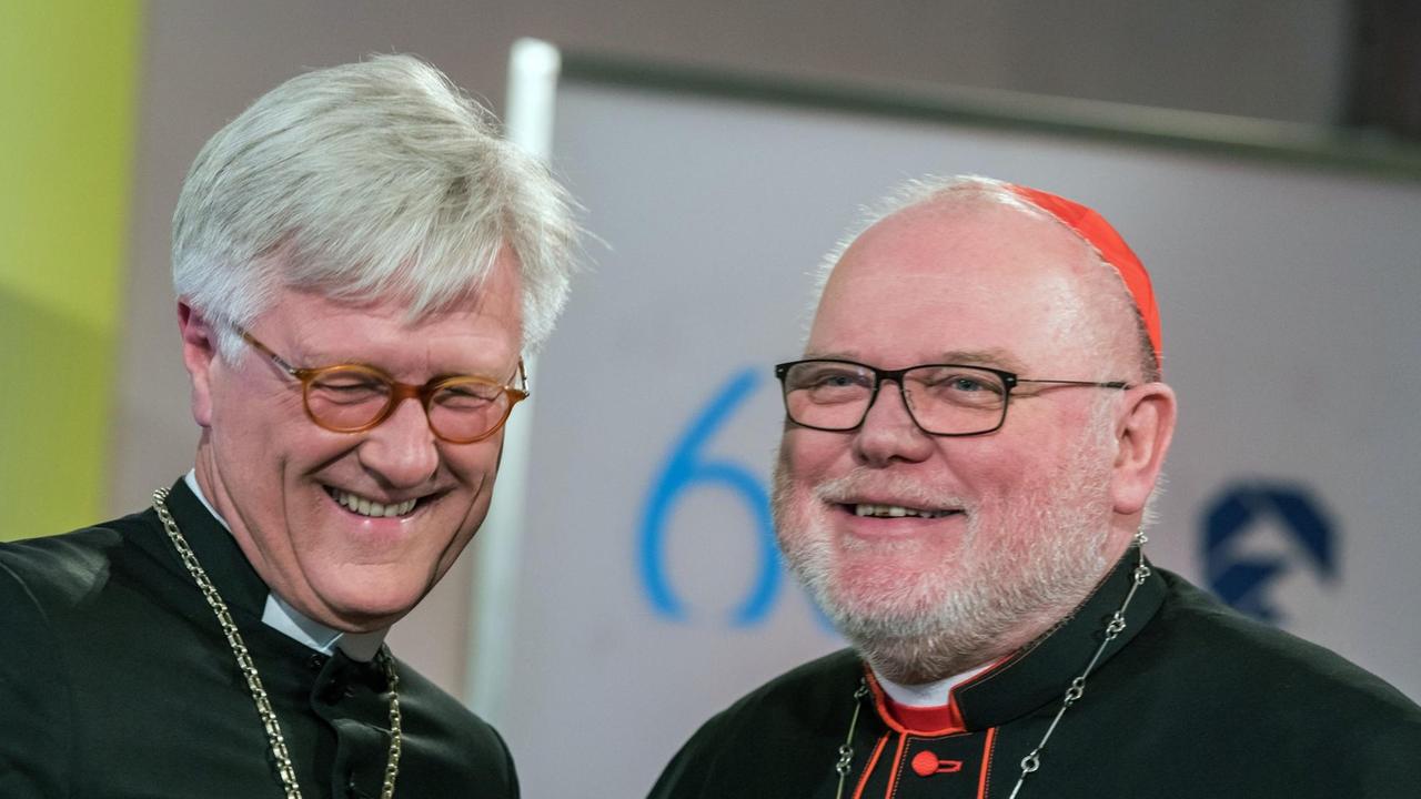 Der evangelische Landesbischof Heinrich Bedford-Strohm (l) und der katholische Kardinal Reinhard Marx. Der evangelische Landesbischof Heinrich Bedford-Strohm (l) und der katholische Kardinal Reinhard Marx.