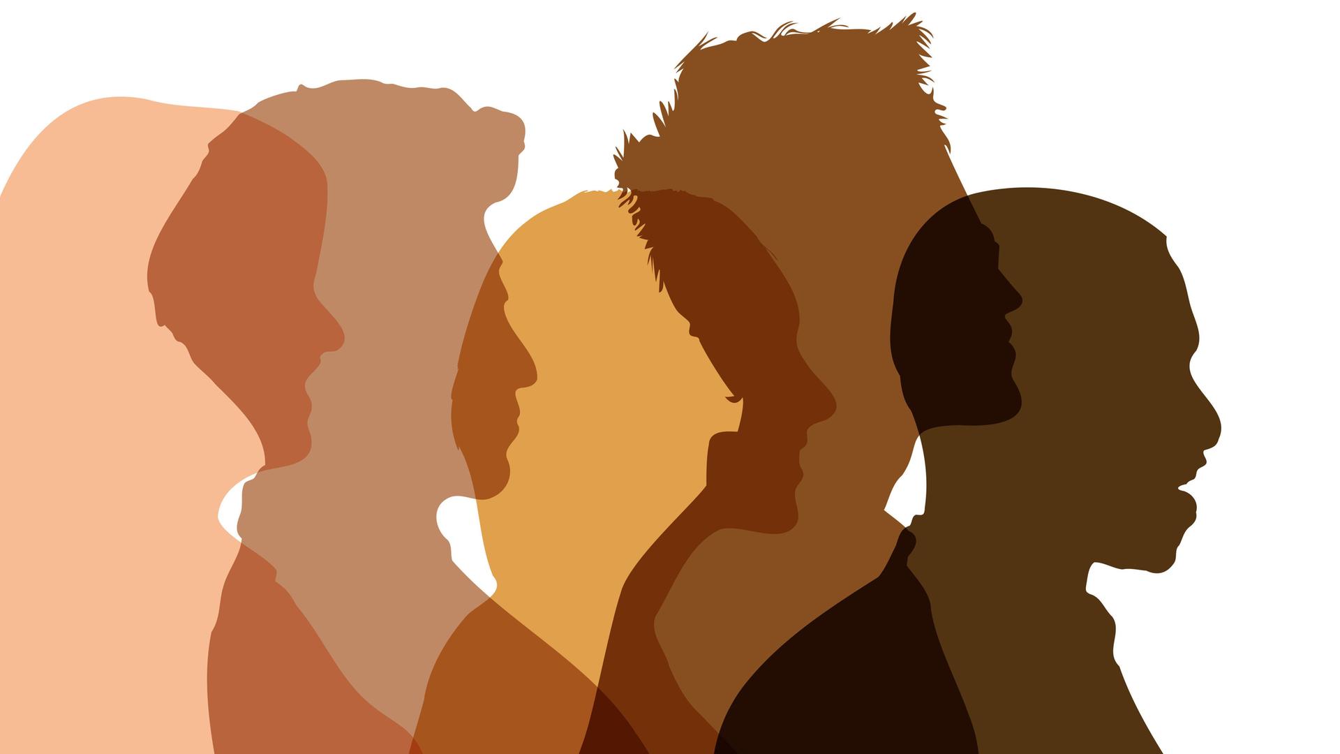 Menschen im Profil in Hautfarben als Zeichen von Vielfalt. Menschen im Profil in Hautfarben als Zeichen von Vielfalt.