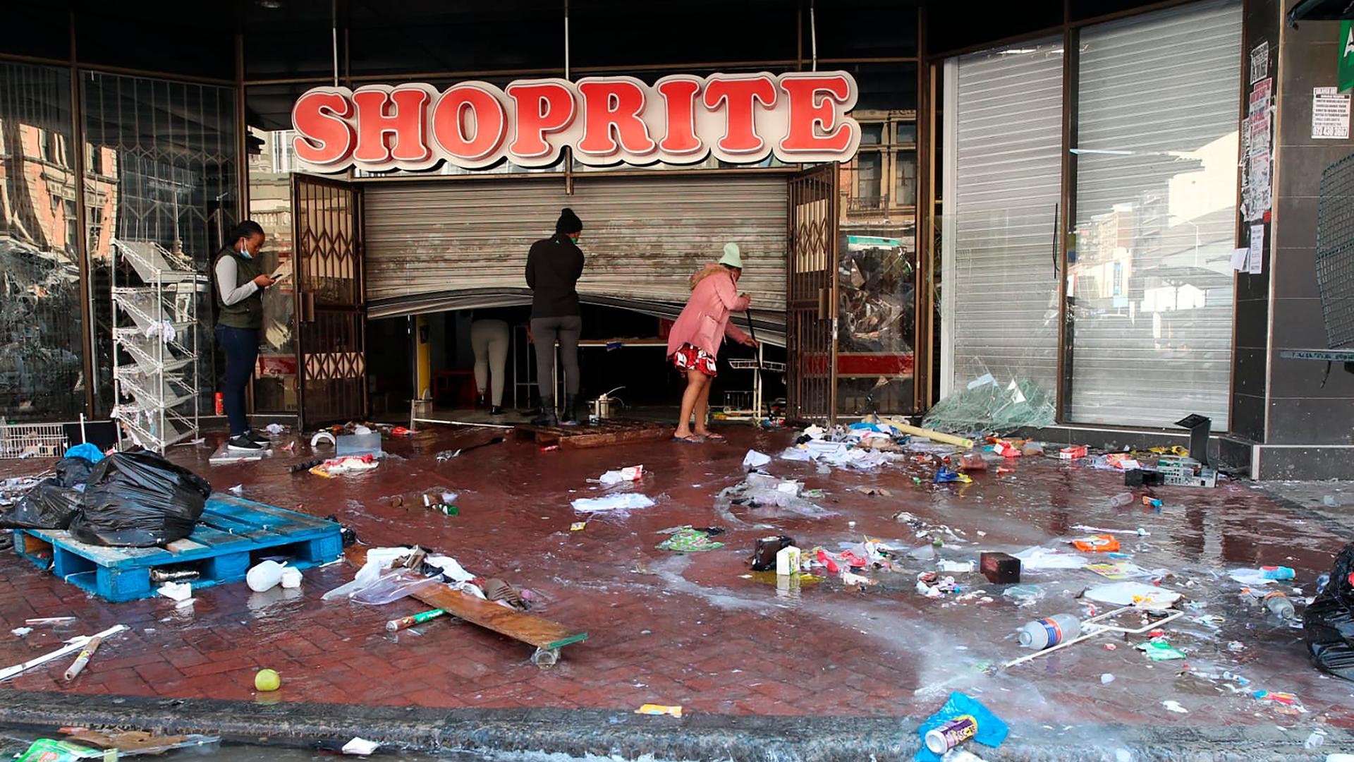 South Africa Zuma Riots - The trashed entrance to a supermarket in Durban South Africa, Thursday, July 15, 2021, as unrest continues in the KwaZulu Natal province. South Africa's army has begun deploying 25,000 troops to assist police in quelling weeklong riots and violence sparked by the imprisonment of former President Jacob Zuma. (AP Photo)