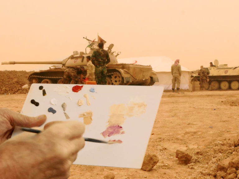 Ein Künstler malt Panzer in Mosul: Werk des Künstlers Francis Alys der "Antiwarcoalition"