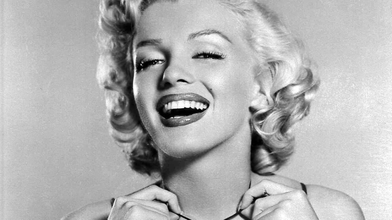 Marilyn Monroe lacht in die Kamera Marilyn Monroe lacht in die Kamera