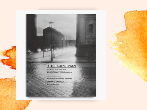 Das Cover des Buches "Die Hauptstadt" von Günter Steffen auf orangefarbenem Pastell-Hintergrund. 