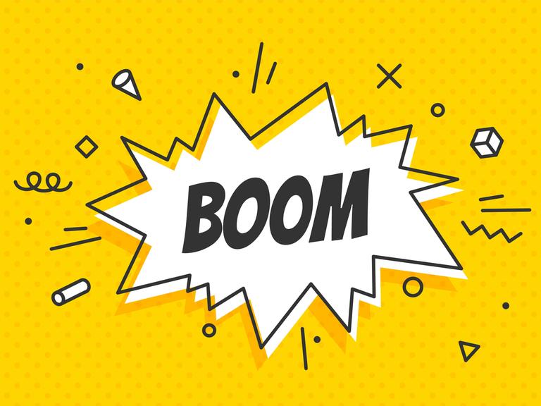 Eine zackige Sprechblase mit der Schrift "Boom" auf gelbem Grund