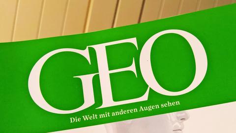 Das Logo der Zeitschrift "GEO" auf grünem Untergrund. Darunter steht: "Die Welt mit anderen Augen sehen.