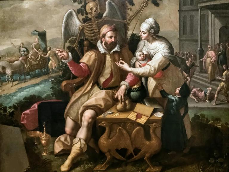 Das Gemälde "Die sieben Todsünden: Gier" zeigt einen prächtig gekleideten Kaufmann, dem eine junge Frau mit Baby einen wertvollen Ring reicht.