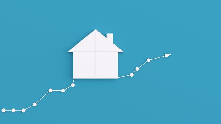 Illustration eines weißen Hauses auf blauem Hintergrund, das auf einer ansteigenden Kurve sitzt.