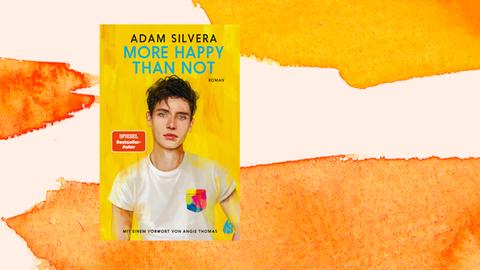 Das Cover des Buchs „More Happy Than Not“ von Adam Silvera zeigt eine Illustration eines jungen Mannes, der den Leser anblickt.
