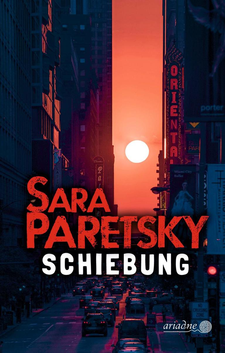 Das Buchcover von Sara Paretskys Krimi, "Schiebung". Es zeigt eine in rötlicher Farben getauchte Straßenschlucht, am Horizont ein Himmelskörper, der für diese Farbe sorgt. Das Bild ist auf der Krimibestenliste von Deutschlandfunk Kultur. Das Buchcover von Sara Paretskys Krimi, "Schiebung". Es zeigt eine in rötlicher Farben getauchte Straßenschlucht, am Horizont ein Himmelskörper, der für diese Farbe sorgt. Das Bild ist auf der Krimibestenliste von Deutschlandfunk Kultur.