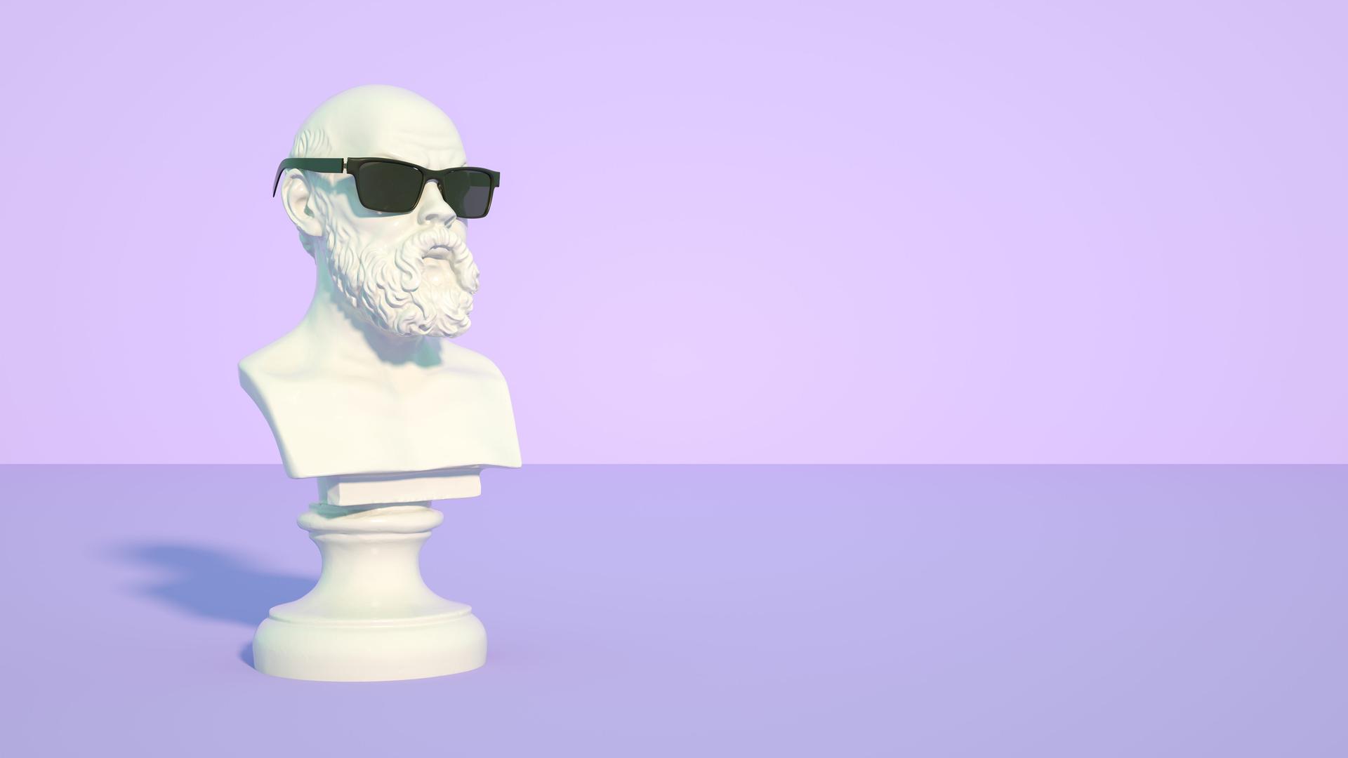 Die antike Büste eines bärtigen Mannes trägt eine Sonnenbrille. Die antike Büste eines bärtigen Mannes trägt eine Sonnenbrille.