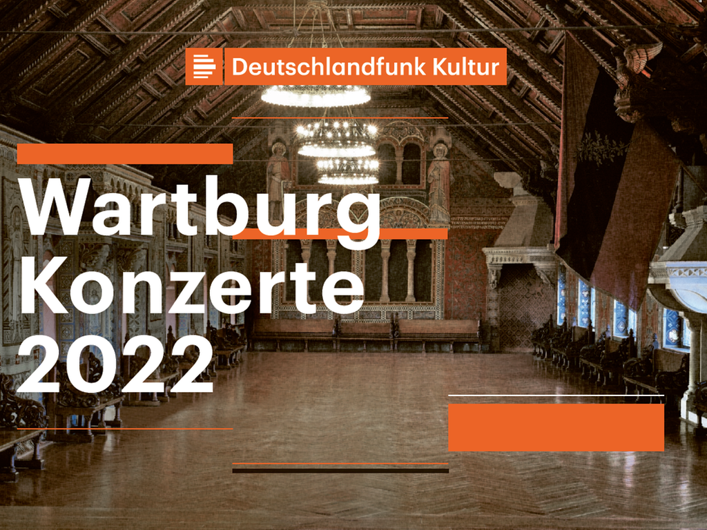 Vor dem Blick in den historischen Raum der Wartburg ist der Schriftzug Wartburg Konzerte 2022 zu lesen.