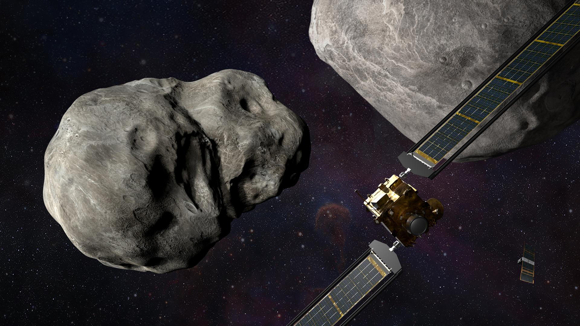 Abbildung der Nasa-Raumsonde DART, die einem kleinen Satelliten ähnelt. Im Hintergrund sind zwei Asteroiden zu sehen. Abbildung der Nasa-Raumsonde DART, die einem kleinen Satelliten ähnelt. Im Hintergrund sind zwei Asteroiden zu sehen.